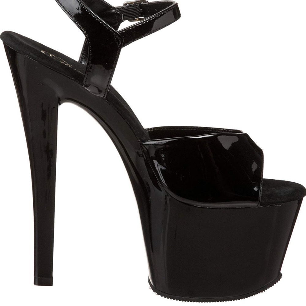 Pleaser black patent platform heel. Size 8. New